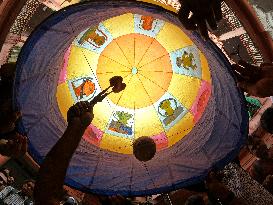 Indian People Enjoy Sight Of Hot Air Balloon Flying During Traditional Diwali Light Balloon Festival