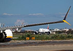 Emirates Boeing  777 on the runway after landing in Barcelona