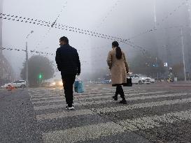 Dense Fog Envelops Beijing