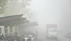 Dense Fog Envelops Beijing