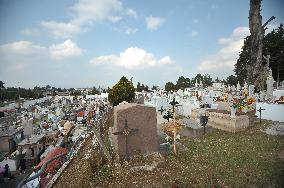 People Visit Cemeteries For Dia De Muertos Celebrations