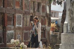 People Visit Cemeteries For Dia De Muertos Celebrations