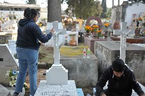 People Visit Cemeteries For Dia De Muertos Celebrations