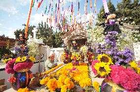 People Visit Cemeteries For Dia De Muertos Celebrations