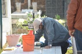 People Visit Cemeteries For Dia De Muertos Celebrations