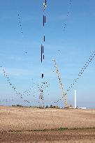 Wind Turbine Installation At Castelluccio Dei Sauri Wind Farm, Italy