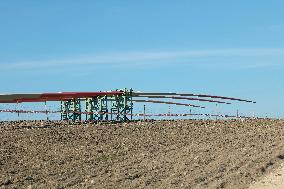 Wind Turbine Installation At Castelluccio Dei Sauri Wind Farm, Italy