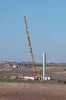 Wind Turbine Installation At Castelluccio Dei Sauri Wind Farm, Italy