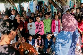 Musicians And Volunteers Perform Classroom - Gaza