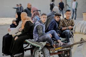 Displaced Palestinians Flee Bombings - Gaza