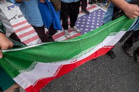 Iranians Burn U.S. And Israeli Flags In Tehran