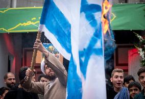 Iranians Burn U.S. And Israeli Flags In Tehran