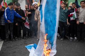 Iranians Burn U.S. And Israeli Flags In Tehran