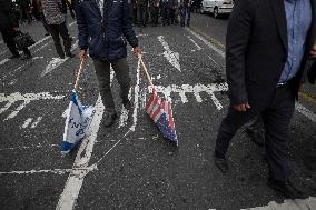 Iranians Burn U.S. And Israeli Flags In Tehran