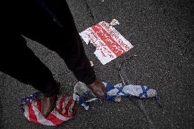 Iranians Burn U.S. And Israeli Flags In Tehran