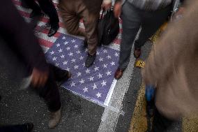 Iranians Burn U.S. And Israeli Flags In Tehran