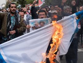 Iranians Burn U.S. And Israeli Flags In Tehran