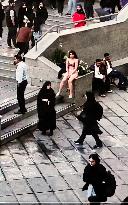 Iranian Woman Detained After Taking Clothes Off At University - Tehran