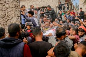 Palestinians Collect Flour - Gaza