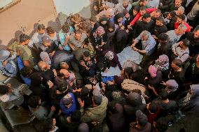 Palestinians Mourn Those Killed In Strikes - Gaza