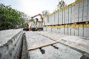 Reconstruction of apartment building damaged by Russian shelling continues in Zaporizhzhia