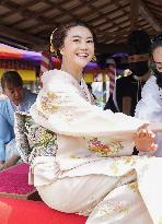 Actress Mizuki takes part in ancient imperial boating party reenacted in Kyoto