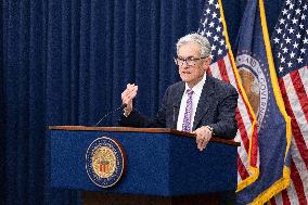 Fed Cuts Interest Rates By A Quarter Point - Washington