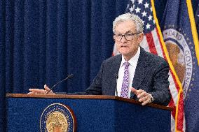 Fed Cuts Interest Rates By A Quarter Point - Washington