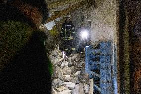 Rescuers Work At The Site Of A Glide Bomb Attack On A Residential Building In Kharkiv