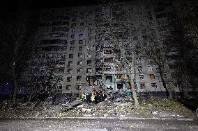 Rescuers Work At The Site Of A Glide Bomb Attack On A Residential Building In Kharkiv