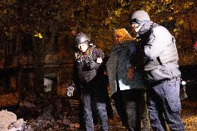 Rescuers Work At The Site Of A Glide Bomb Attack On A Residential Building In Kharkiv