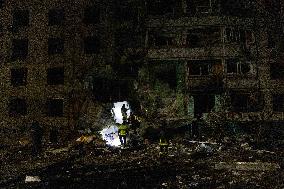 Rescuers Work At The Site Of A Glide Bomb Attack On A Residential Building In Kharkiv