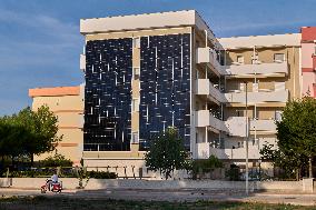 Photovoltaic Facade On Residential Building In Margherita Di Savoia, Italy