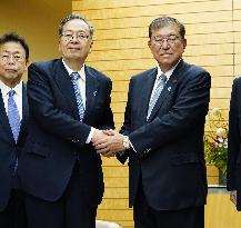 CORRECTED: New head of Japan coalition partner Komeito