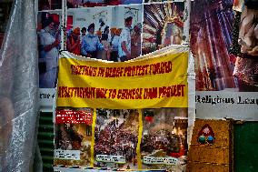 Tibetans Protest The Destruction Of A Buddhist Monastery And The Forced Resettlement Of Tibetans By The Chinese