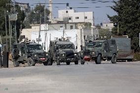 Israeli Forces Kill A PalestinianIn Raid On Occupied West Bank