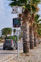 Solar-Powered Speed Bump On Urban Roadside