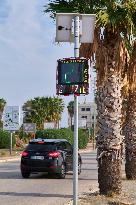 Solar-Powered Speed Bump On Urban Roadside