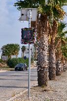 Solar-Powered Speed Bump On Urban Roadside