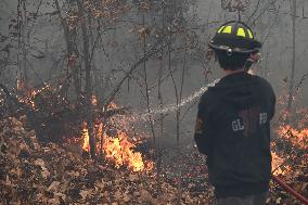 Firefighters Battle Wildfire In Greenwood Lake New York Following Death Of New York State Parks Employee Fighting Fire