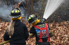 Firefighters Battle Wildfire In Greenwood Lake New York Following Death Of New York State Parks Employee Fighting Fire