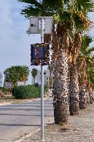 Solar-Powered Speed Bump On Urban Roadside