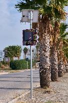 Solar-Powered Speed Bump On Urban Roadside