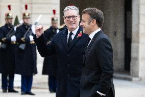 Emmanuel Macron meets Keir Starmer at the Elysee Palace - Paris