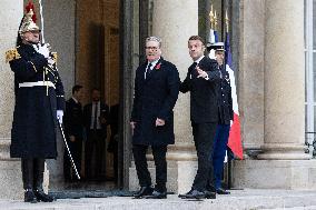 Emmanuel Macron meets Keir Starmer at the Elysee Palace - Paris