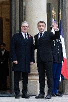 Emmanuel Macron meets Keir Starmer at the Elysee Palace - Paris