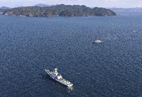 Japan minesweeper sinks after catching fire