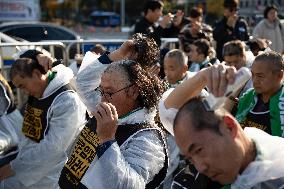 100 Cargo Union Members Shave Heads In Protest To Demand Legislation For Safe Freight Rates