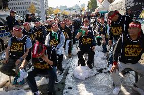 100 Cargo Union Members Shave Heads In Protest To Demand Legislation For Safe Freight Rates