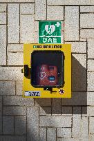 Public Defibrillator Mounted On City Wall